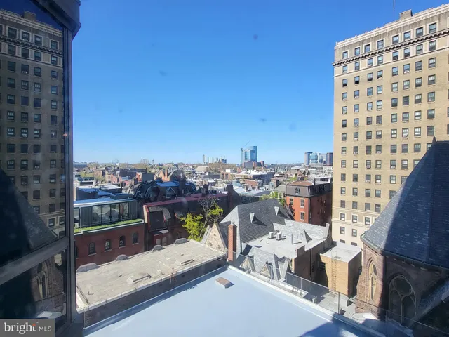 a view of a balcony with city view