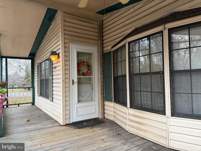 a view of a glass door of the house