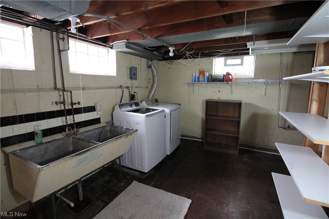 8025 Ackley Road Parma, OH 44129 - Photo 24 of 31 Laundry area featuring washer and dryer