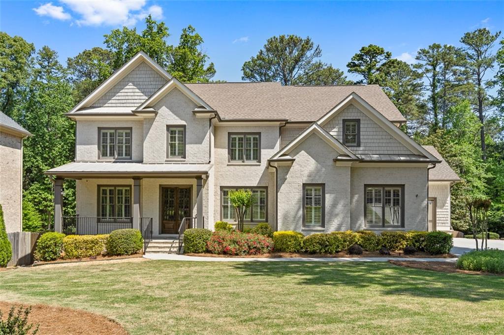 2736 Pangborn Road Decatur, GA 30033 - Photo 1 of 47 a front view of a house with a yard