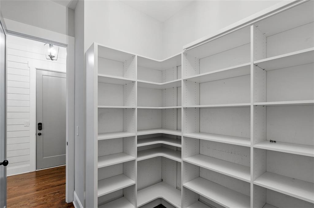 2736 Pangborn Road Decatur, GA 30033 - Photo 13 of 47 a view of walk in closet with empty racks