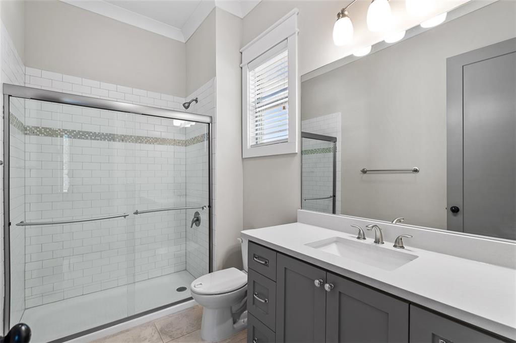 2736 Pangborn Road Decatur, GA 30033 - Photo 18 of 47 a bathroom with a granite countertop sink toilet and shower