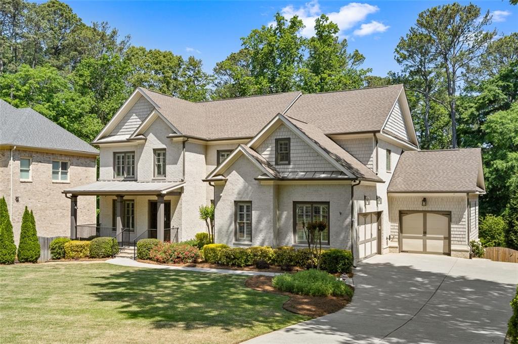 2736 Pangborn Road Decatur, GA 30033 - Photo 2 of 47 a front view of a house with a yard