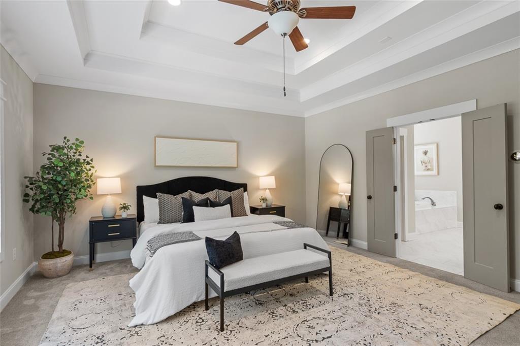 2736 Pangborn Road Decatur, GA 30033 - Photo 21 of 47 a bedroom with a bed and a potted plant