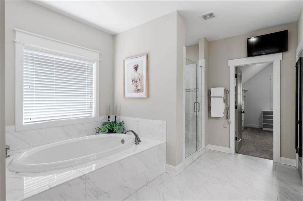 2736 Pangborn Road Decatur, GA 30033 - Photo 23 of 47 a bathroom with a bathtub and a shower