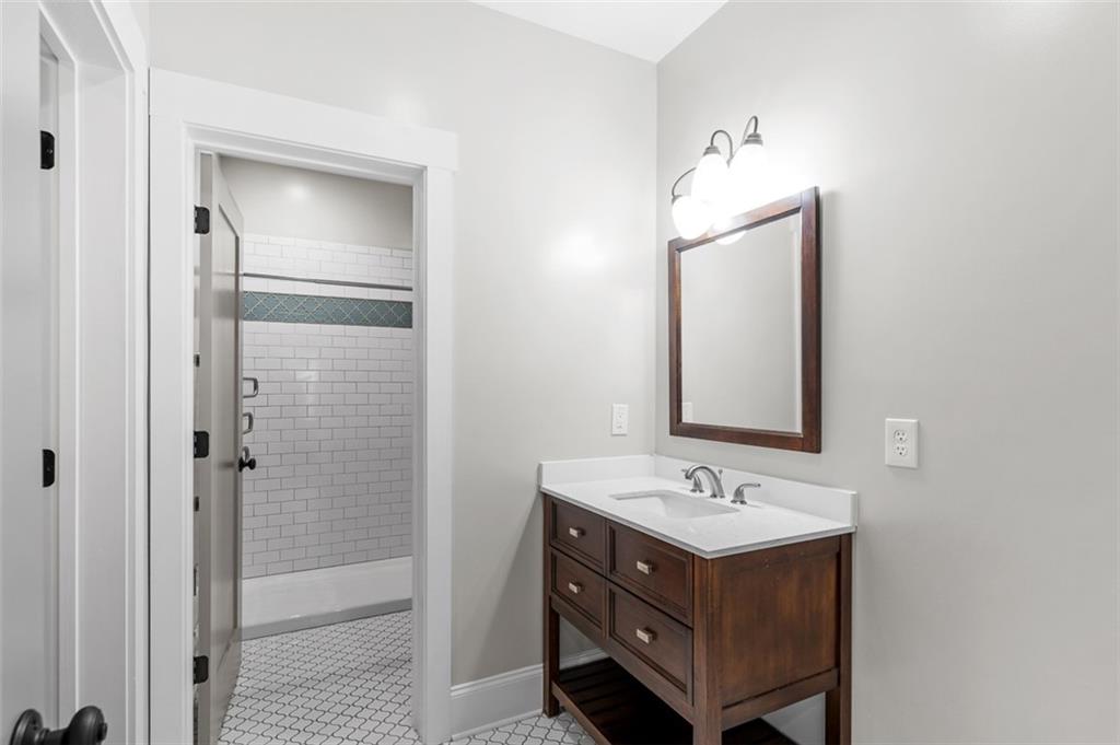 2736 Pangborn Road Decatur, GA 30033 - Photo 36 of 47 a bathroom with a sink vanity and mirror