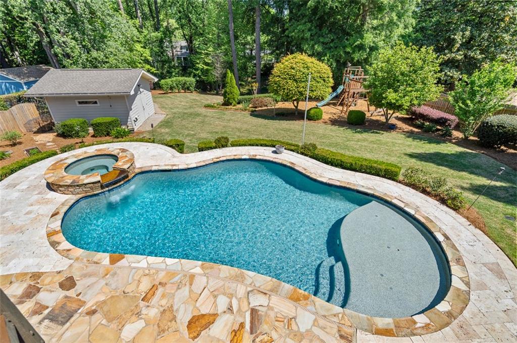 2736 Pangborn Road Decatur, GA 30033 - Photo 44 of 47 a view of a swimming pool with a yard