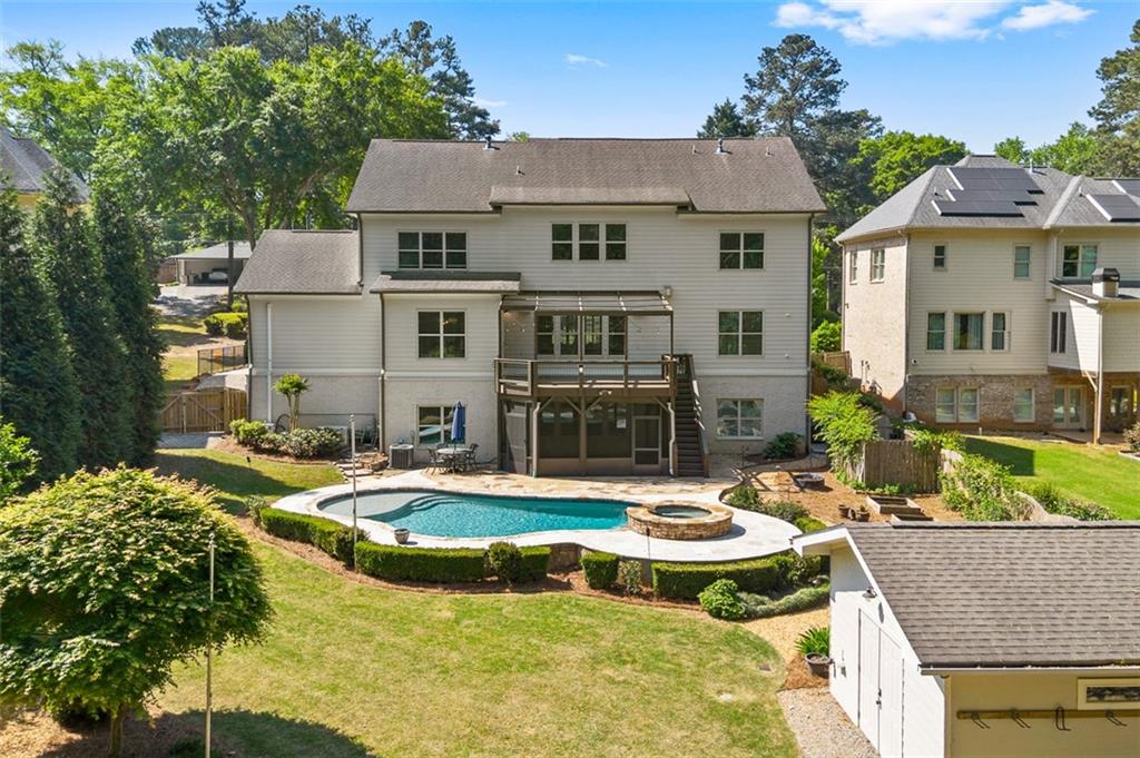 2736 Pangborn Road Decatur, GA 30033 - Photo 45 of 47 a view of house with swimming pool and outdoor seating