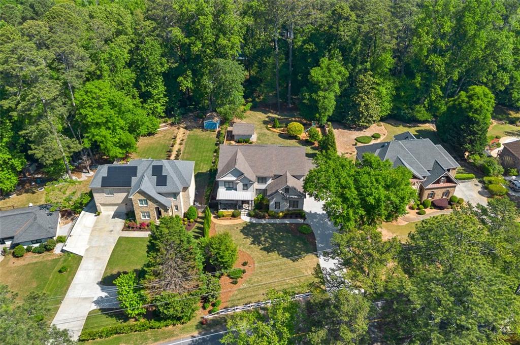 2736 Pangborn Road Decatur, GA 30033 - Photo 47 of 47 an aerial view of a house with a yard and trees all around