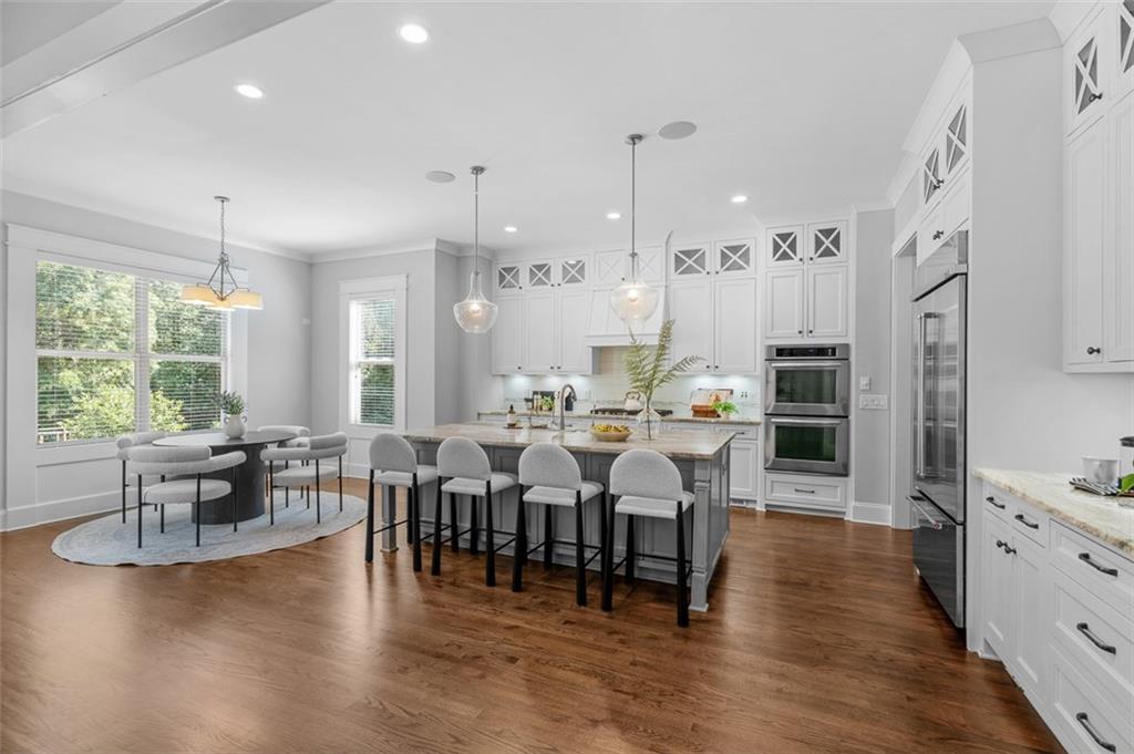 2736 Pangborn Road Decatur, GA 30033 - Photo 10 of 47 a large kitchen with lots of counter space dining table and chairs