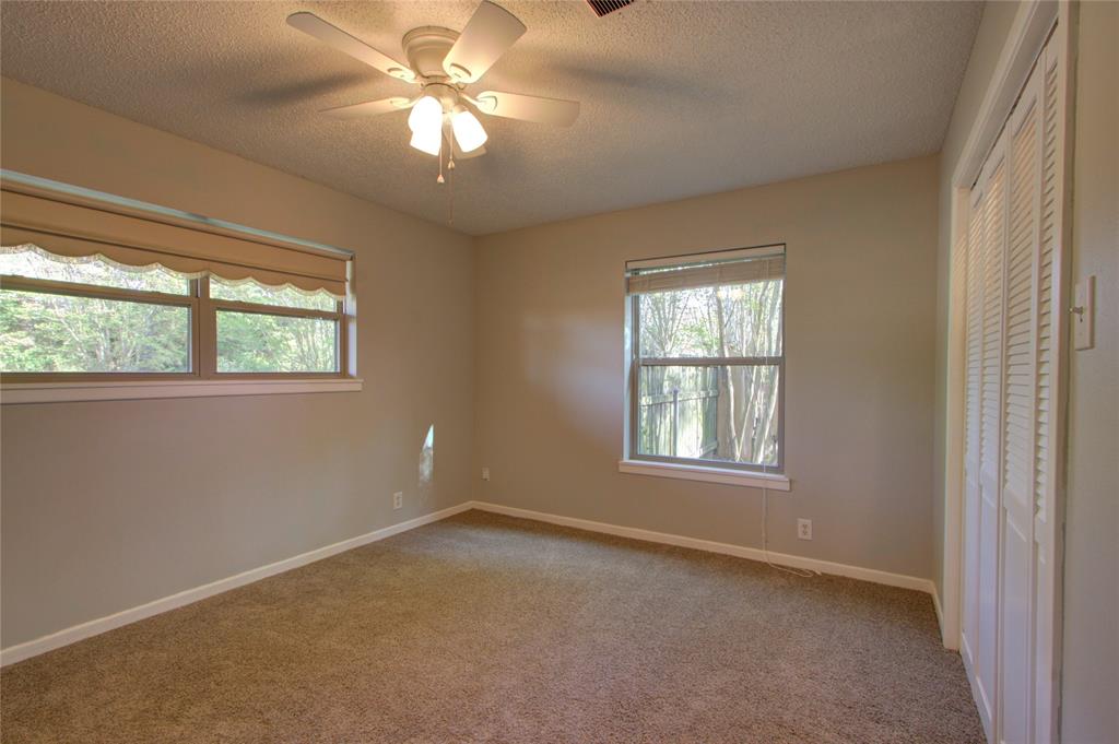 4207 Hazel Street Texarkana, TX 75503 - Photo 19 of 30 an empty room with a window and a fan