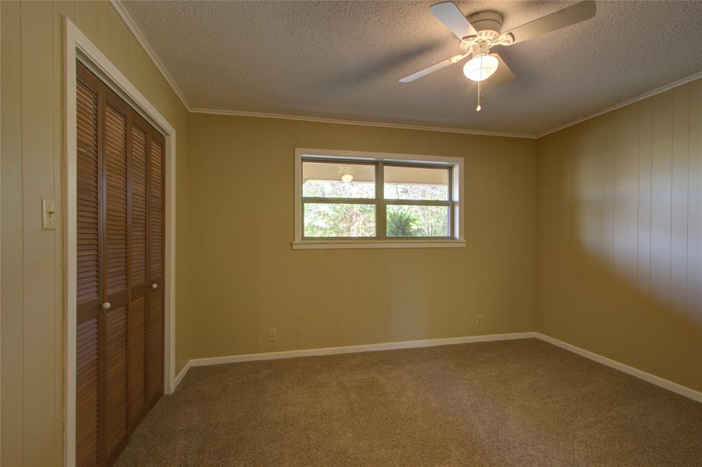 4207 Hazel Street Texarkana, TX 75503 - Photo 20 of 30 an empty room with windows and fan