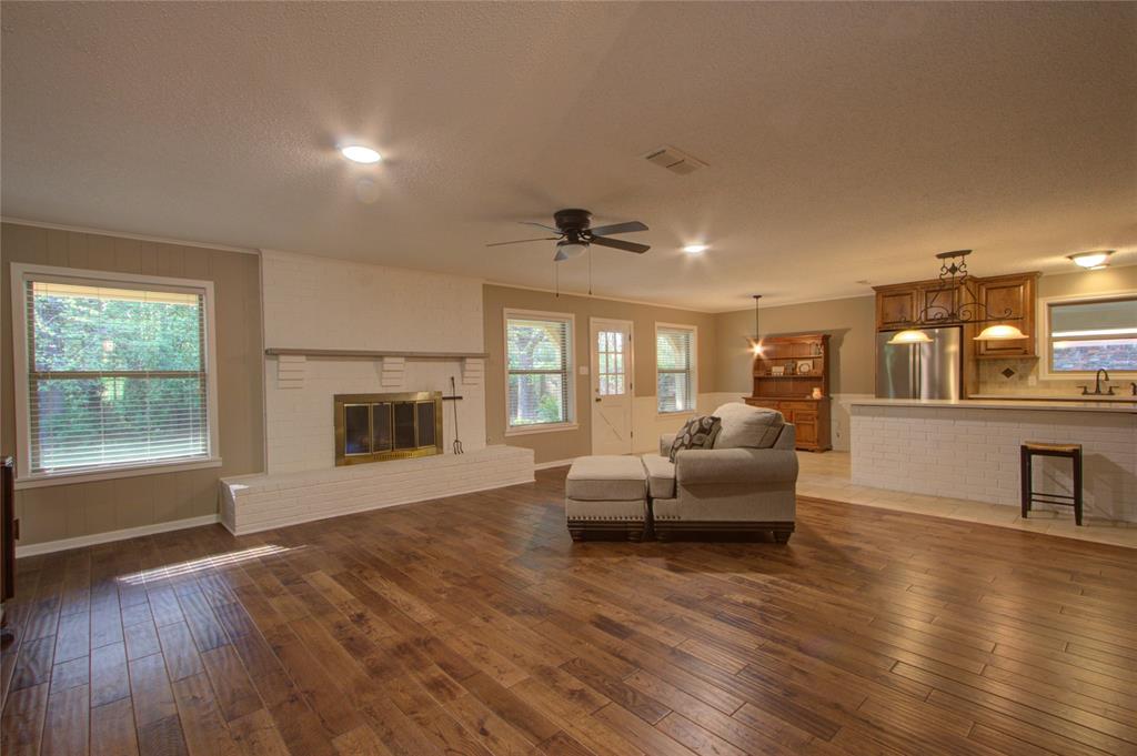 4207 Hazel Street Texarkana, TX 75503 - Photo 2 of 30 a living room with furniture and a fireplace