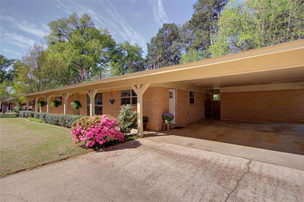 4207 Hazel Street Texarkana, TX 75503 - Photo 26 of 30 a front view of a house with garden