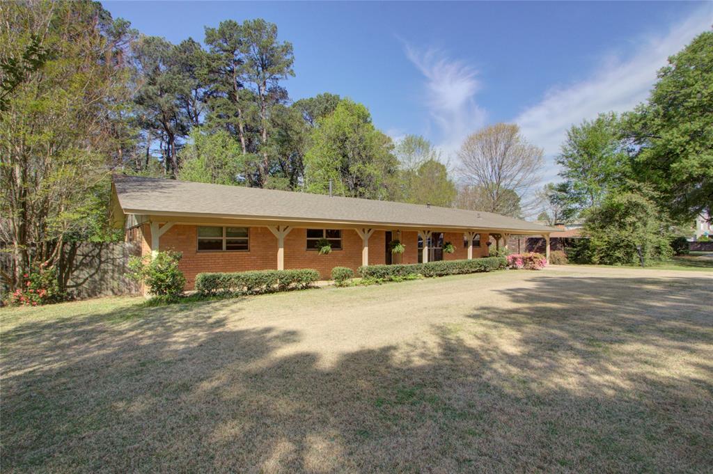 4207 Hazel Street Texarkana, TX 75503 - Photo 29 of 30 a front view of a house with a garden