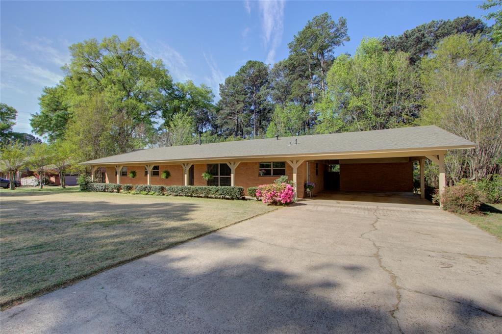 4207 Hazel Street Texarkana, TX 75503 - Photo 6 of 30 a front view of a house with garden