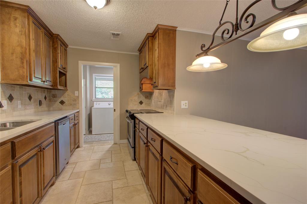 4207 Hazel Street Texarkana, TX 75503 - Photo 10 of 30 a view of a kitchen with sink and dishwasher