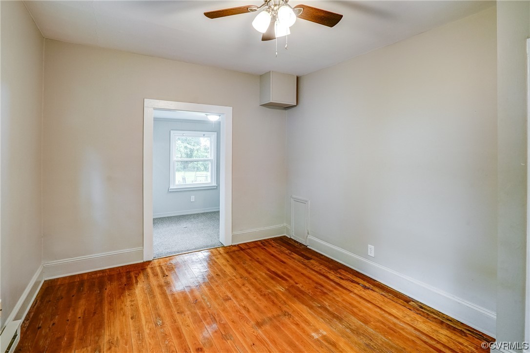 4306 Britannia Road Richmond, VA 23234 - Photo 14 of 20 a view of empty room with wooden floor