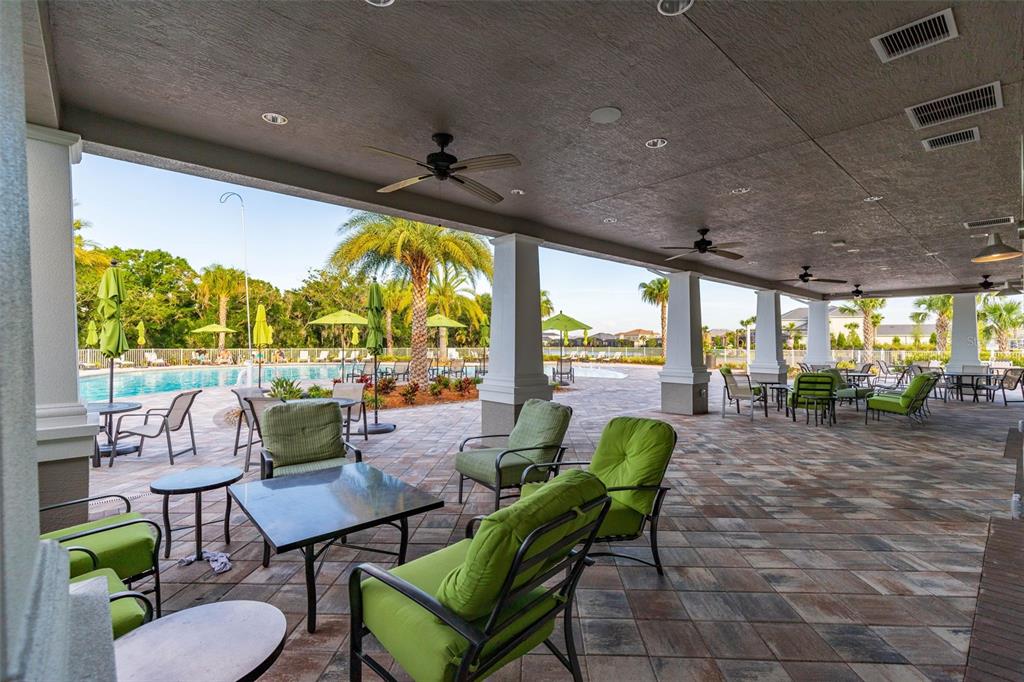 3508 Anchor Bay Trail Lakewood Ranch, FL 34211 - Photo 58 of 74 a building outdoor space with patio furniture