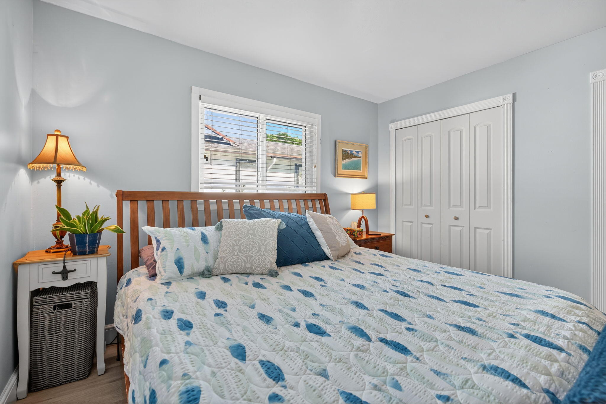 5095 Southeast Manatee Terrace Stuart, FL 34997 - Photo 27 of 58 a bedroom with a bed and a window