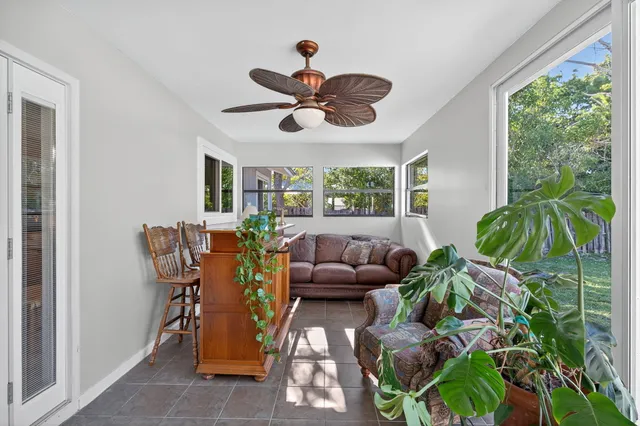 a view of house with a big yard