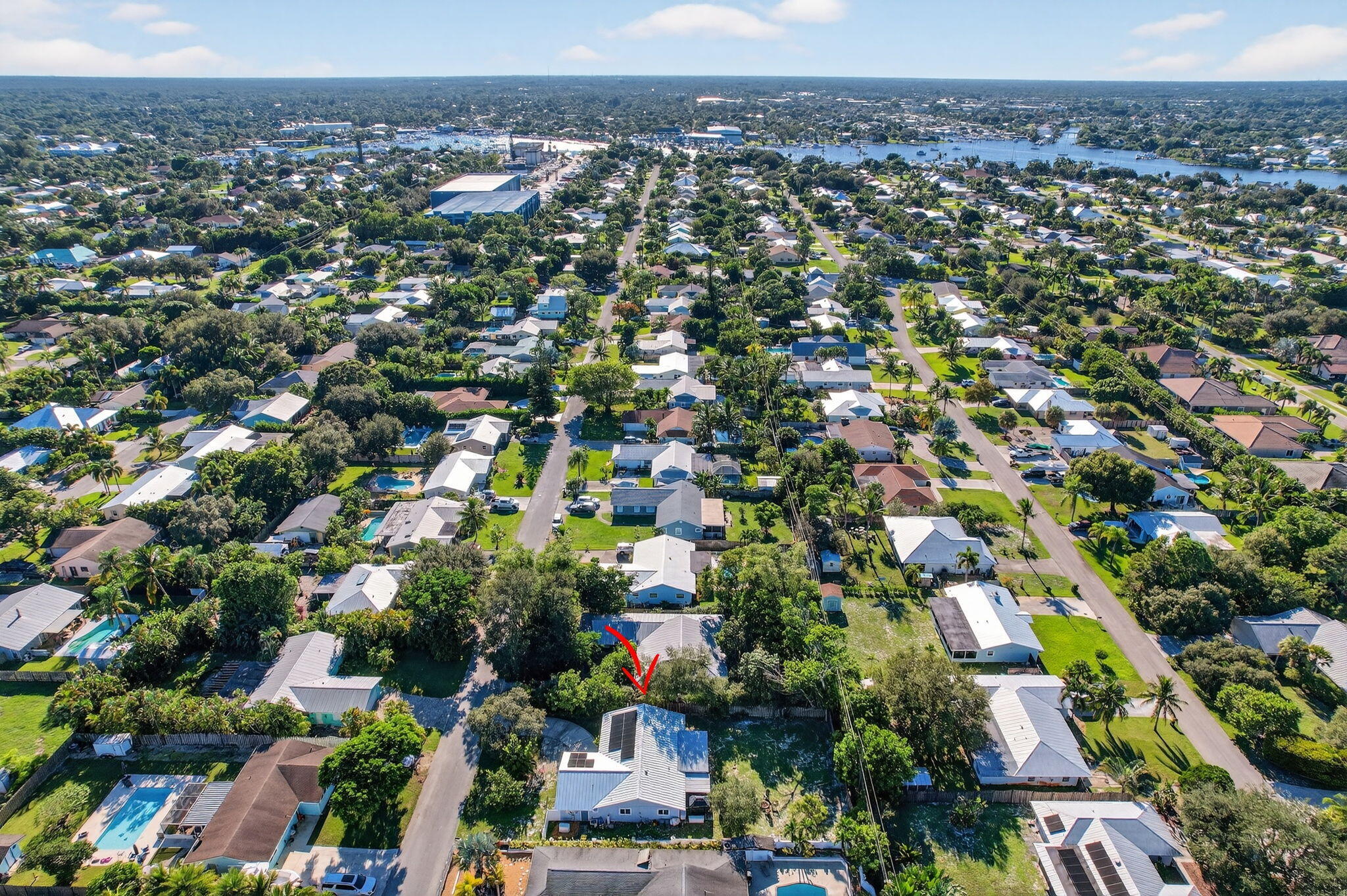 5095 Southeast Manatee Terrace Stuart, FL 34997 - Photo 47 of 58 an aerial view of a city