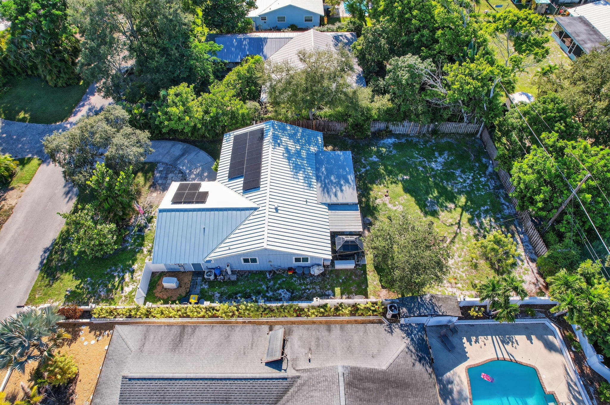 5095 Southeast Manatee Terrace Stuart, FL 34997 - Photo 54 of 58 an aerial view of a house
