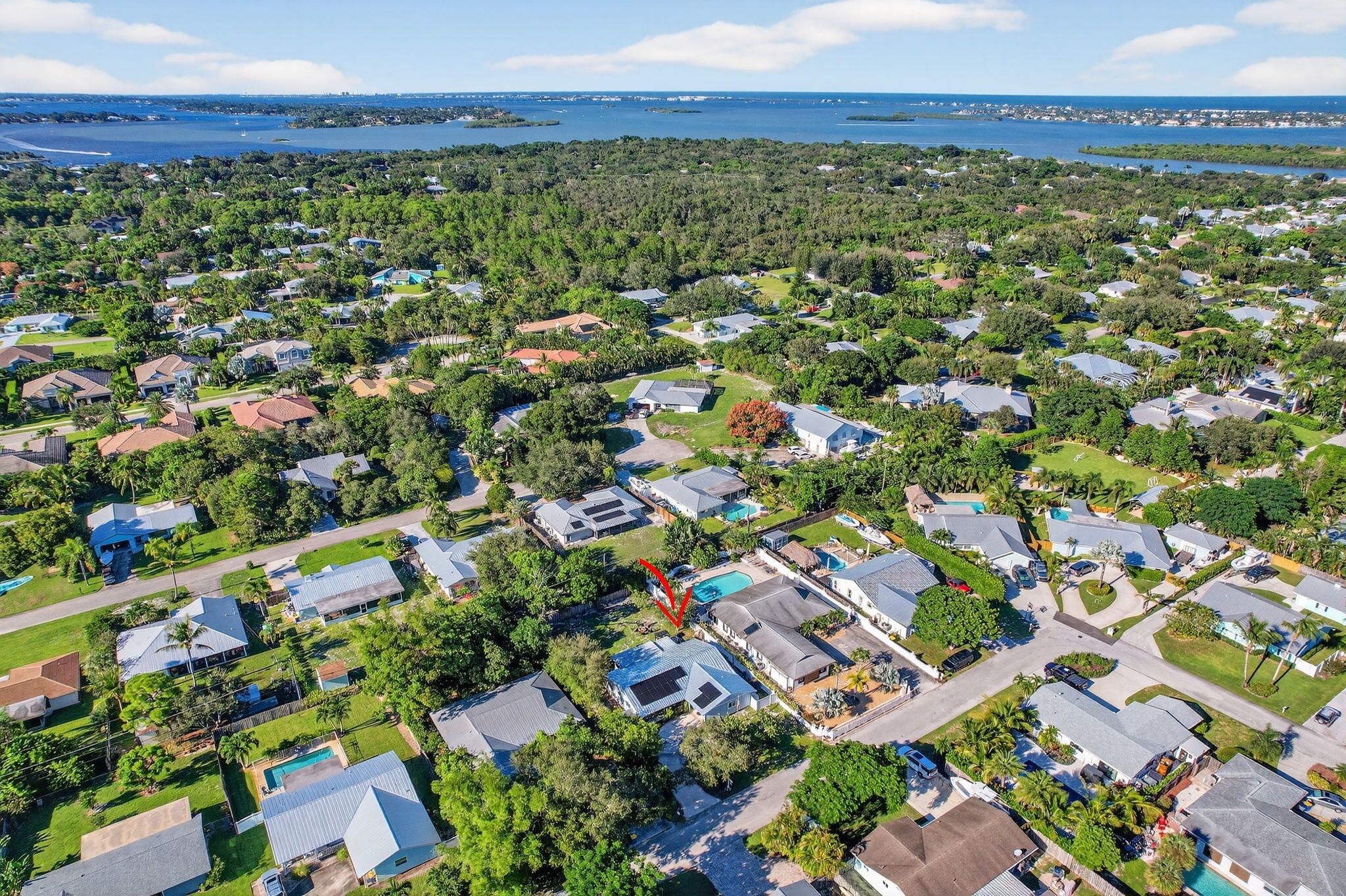 5095 Southeast Manatee Terrace Stuart, FL 34997 - Photo 7 of 58 an aerial view of multiple house