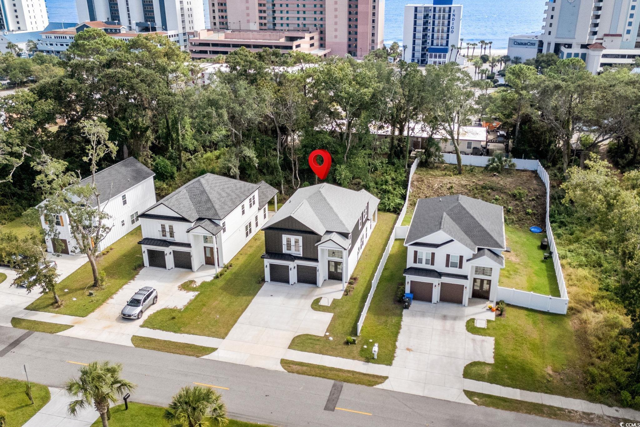2247 Sand Dunes Drive Myrtle Beach, SC 29577 - Photo 2 of 40 View of urban area featuring a nearby body of water
