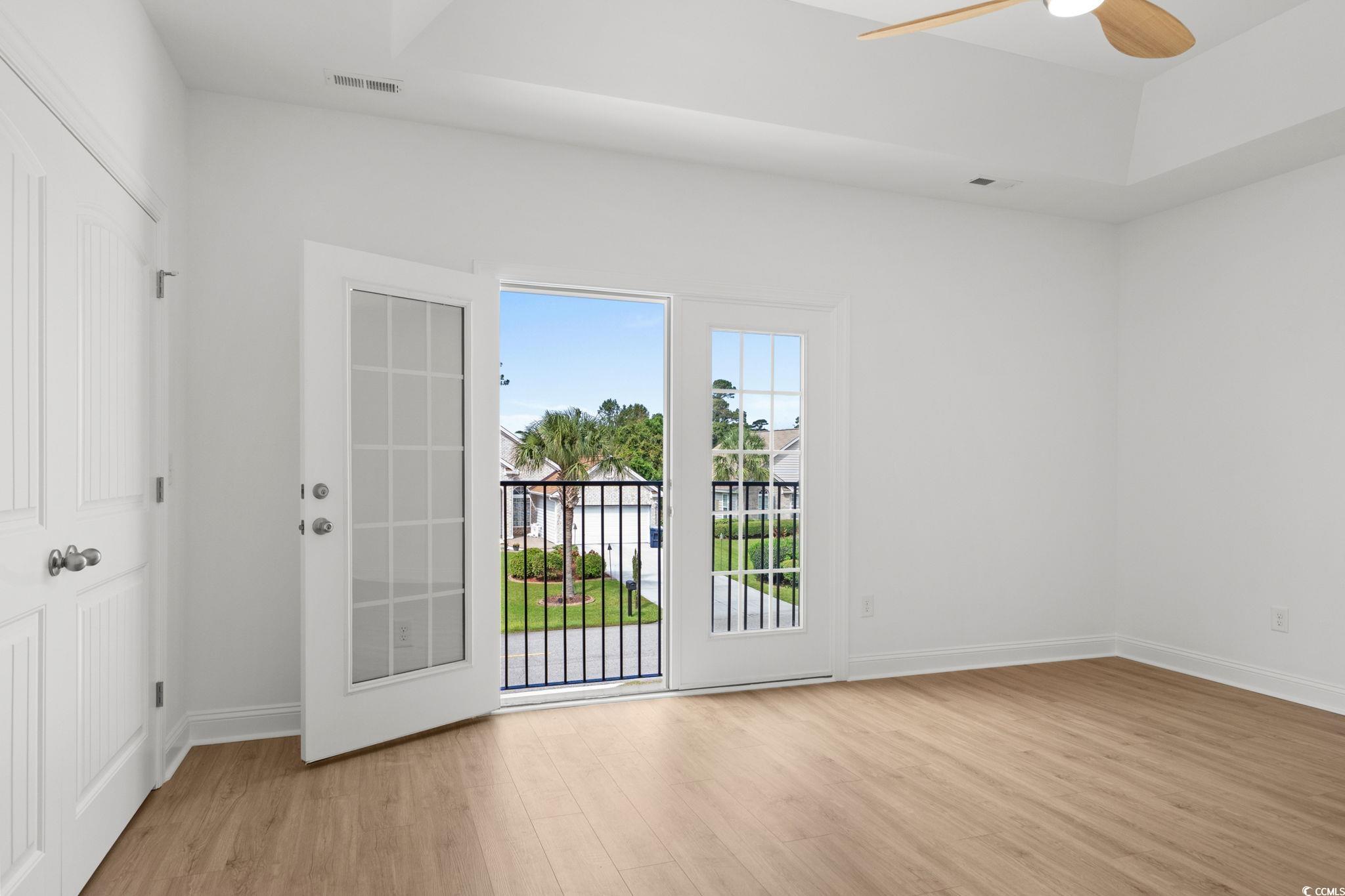 2247 Sand Dunes Drive Myrtle Beach, SC 29577 - Photo 22 of 40 Spare room with light wood-type flooring and a ceiling fan