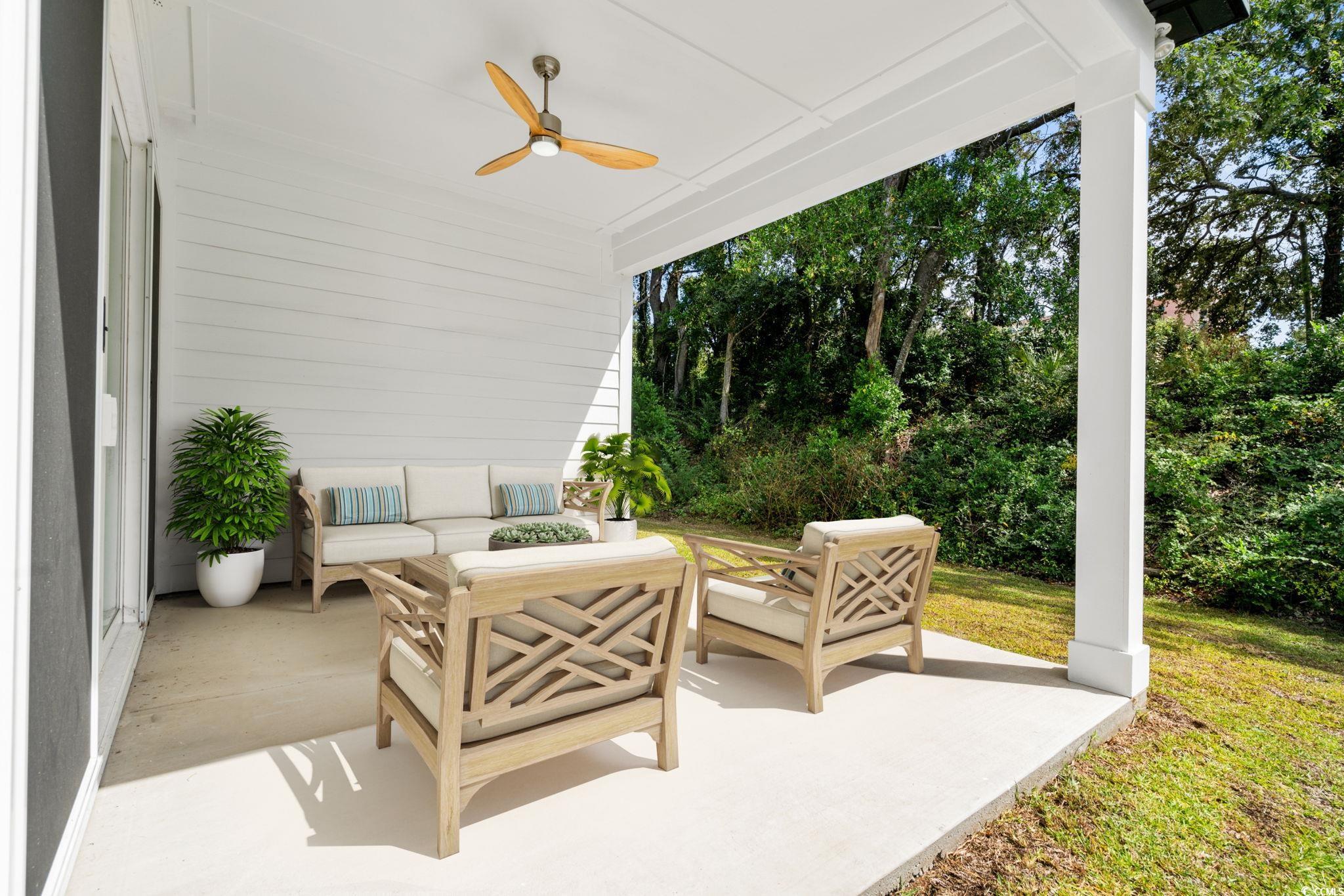 2247 Sand Dunes Drive Myrtle Beach, SC 29577 - Photo 30 of 40 View of patio featuring a ceiling fan and an outdoor hangout area
