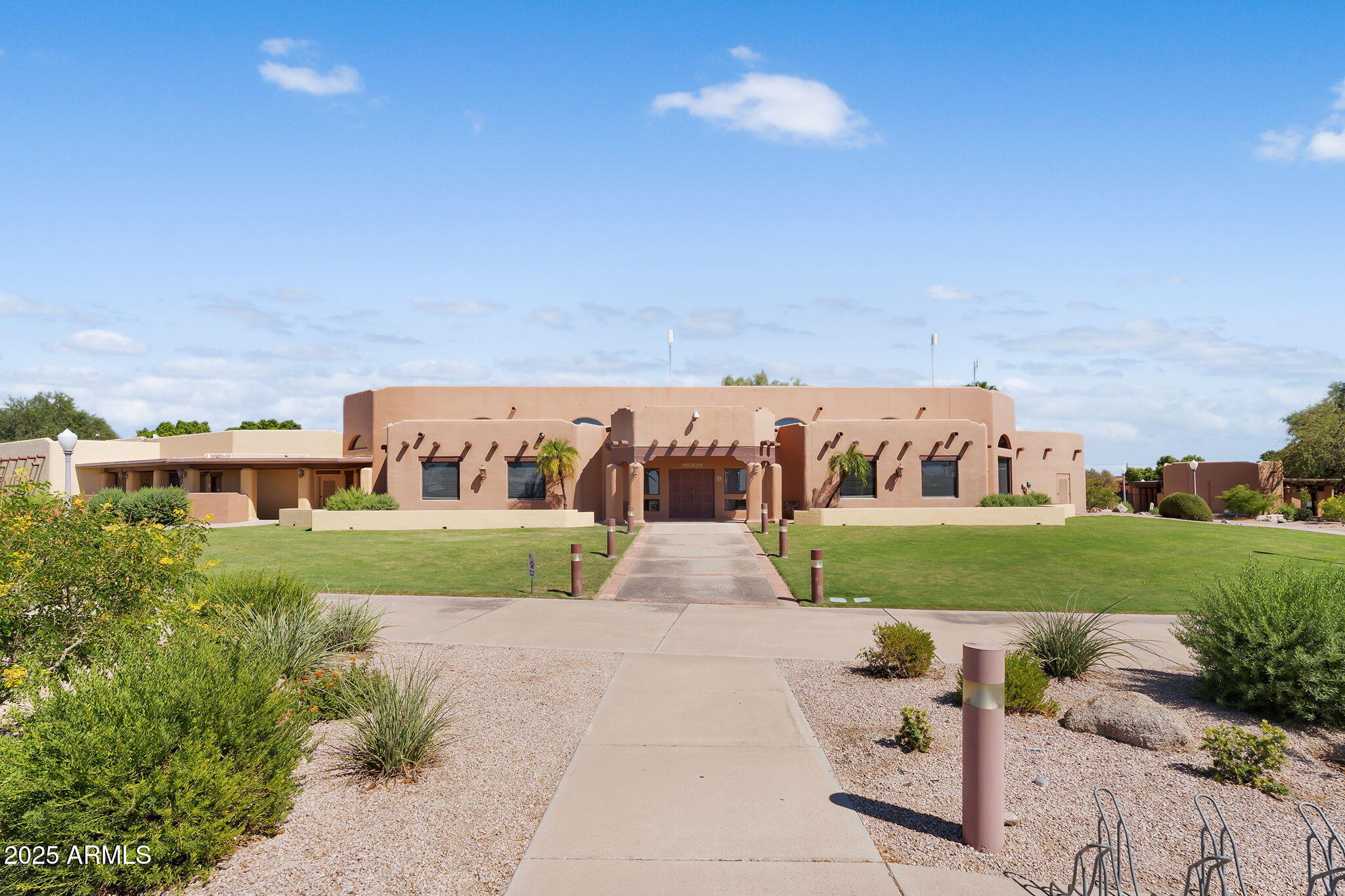8865 East Baseline Road, Unit 802 Mesa, AZ 85209 - Photo 32 of 44 a view of a street with a building in the background