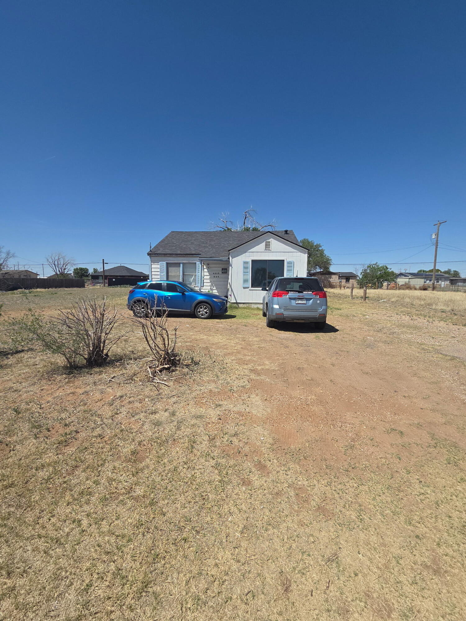 4215 East 65th Street Lubbock, TX 79403 - Photo 1 of 5 a view of a terrace with chairs