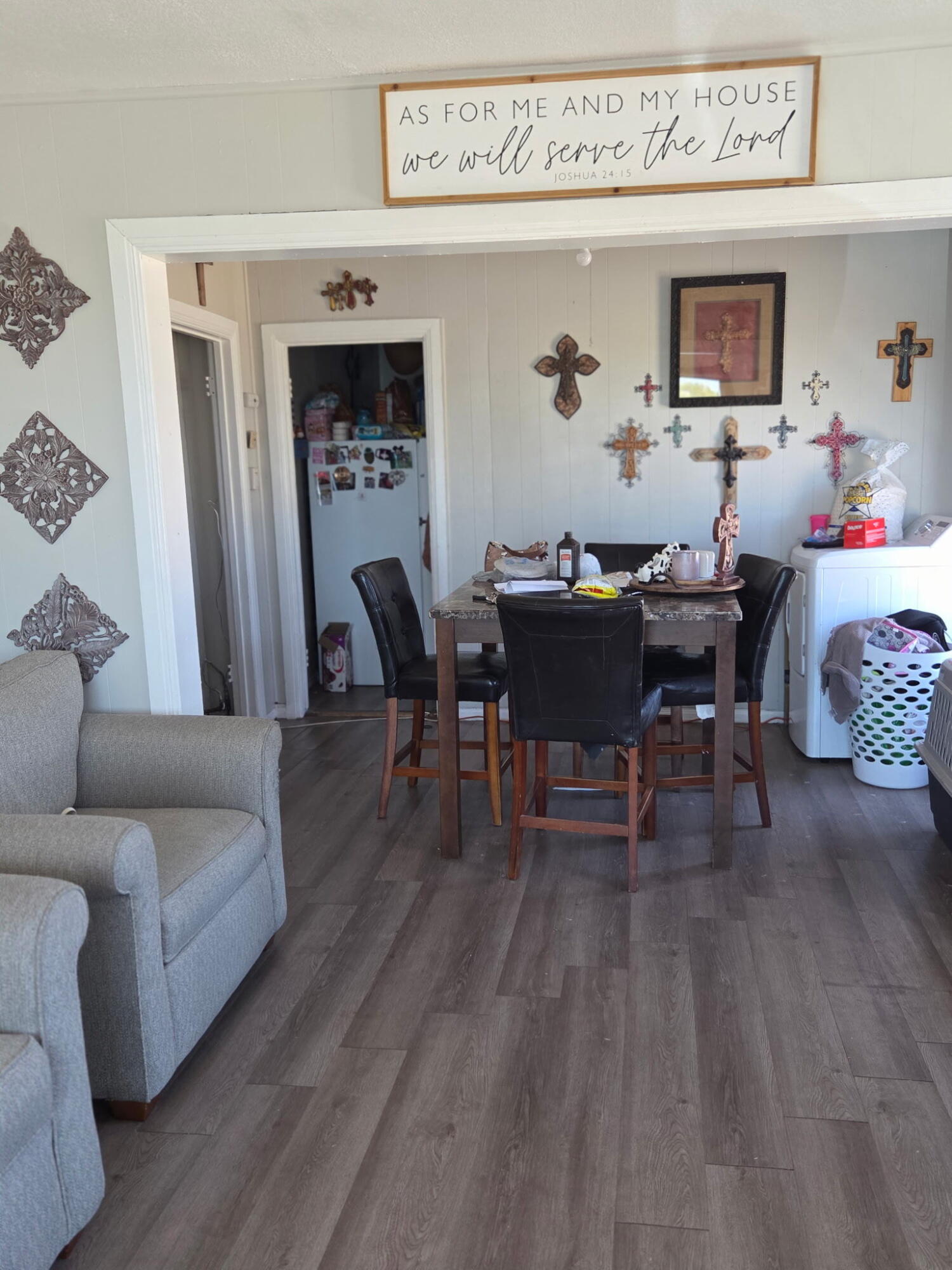 4215 East 65th Street Lubbock, TX 79403 - Photo 4 of 5 a living room with furniture and a wooden floor