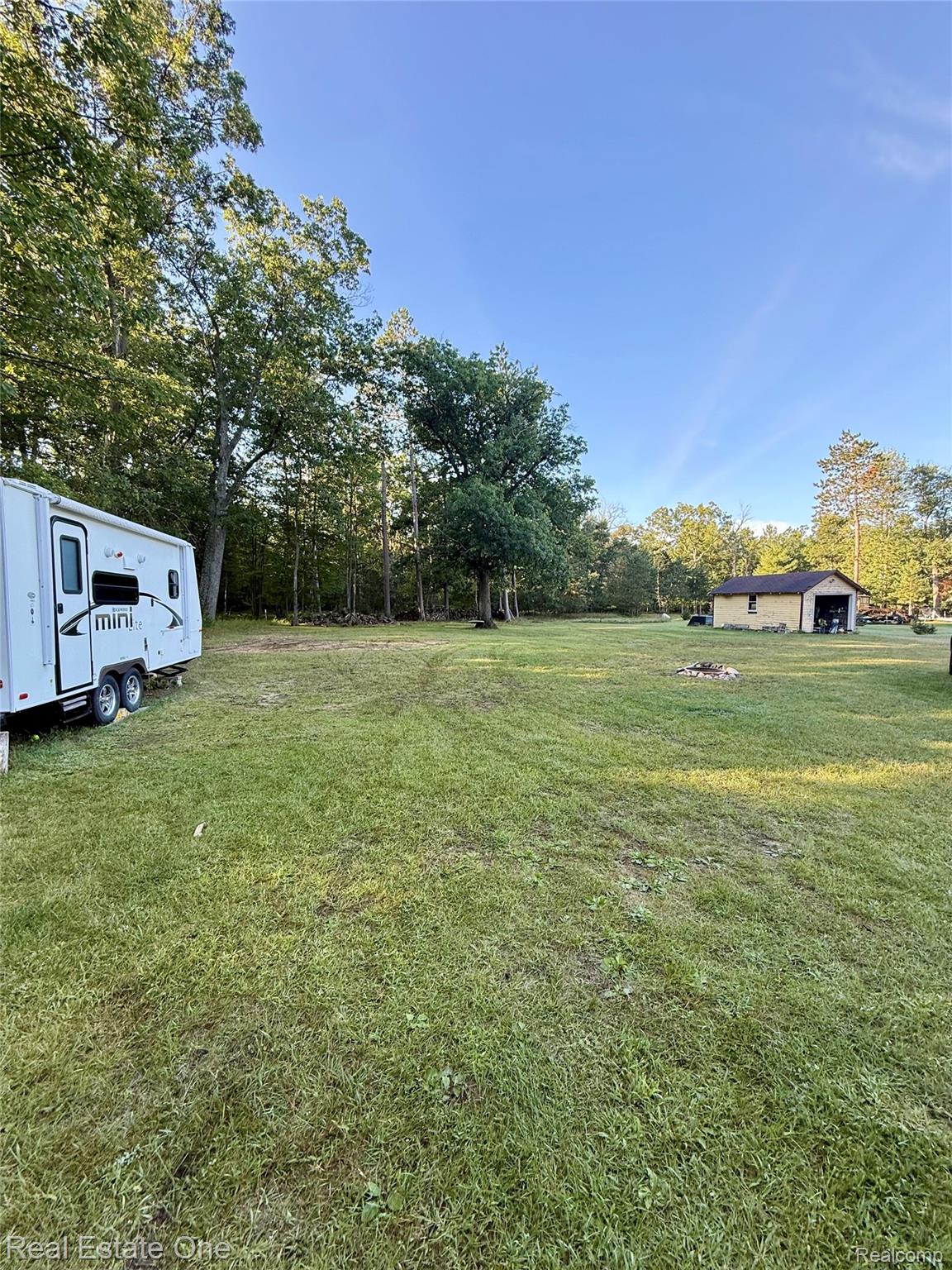 5608 Butler Road St. Helen, MI 48656 - Photo 18 of 19 Backyard with covered structure