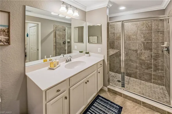 a bathroom with a sink toilet and mirror