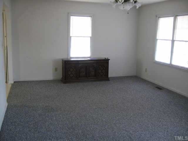 3517 Old Stage Road North Angier, NC 27501 - Photo 4 of 5 an empty room with a window