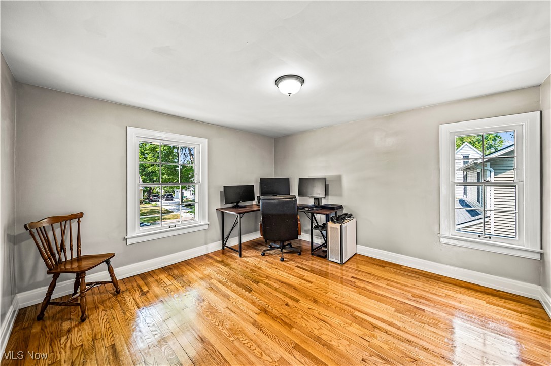 8219 Midland Road Mentor, OH 44060 - Photo 17 of 34 Home office with light hardwood / wood-style floors and a wealth of natural light