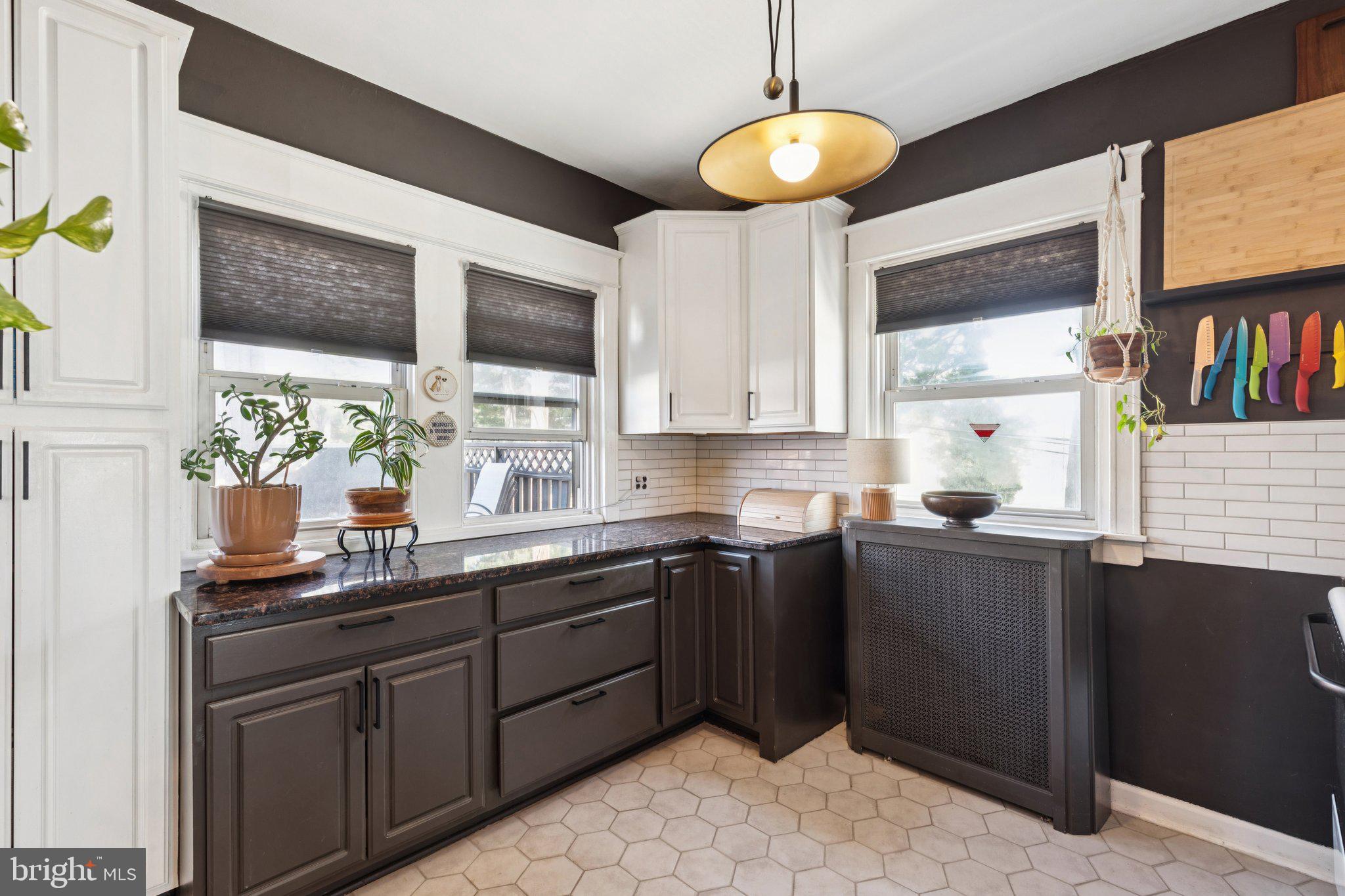 674 Wendover Street Philadelphia, PA 19128 - Photo 17 of 50 Chic kitchen with modern elegance.