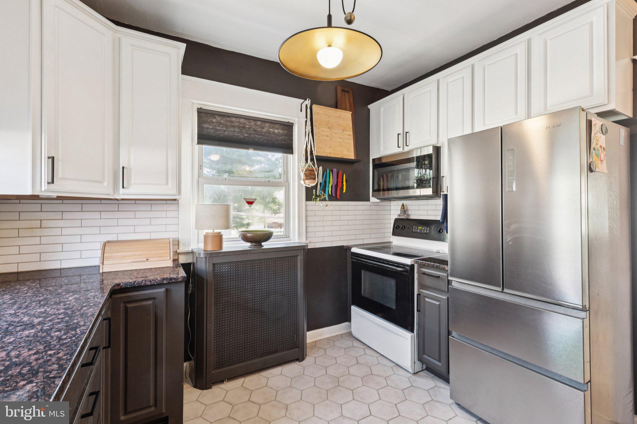 674 Wendover Street Philadelphia, PA 19128 - Photo 18 of 50 Charming kitchen with modern flair.