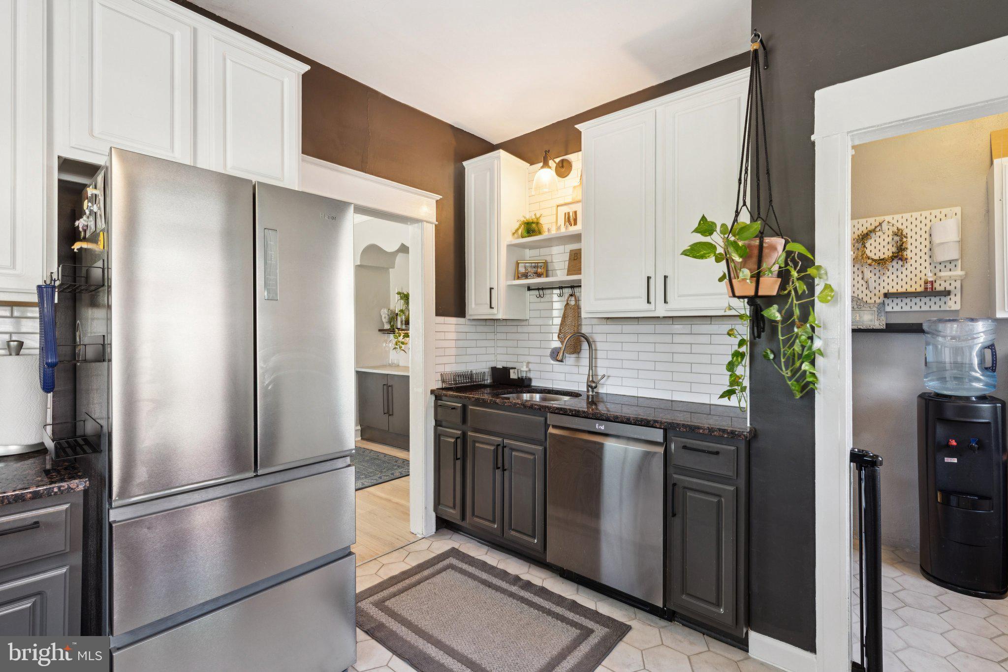 674 Wendover Street Philadelphia, PA 19128 - Photo 20 of 50 Modern kitchen with sleek finishes.