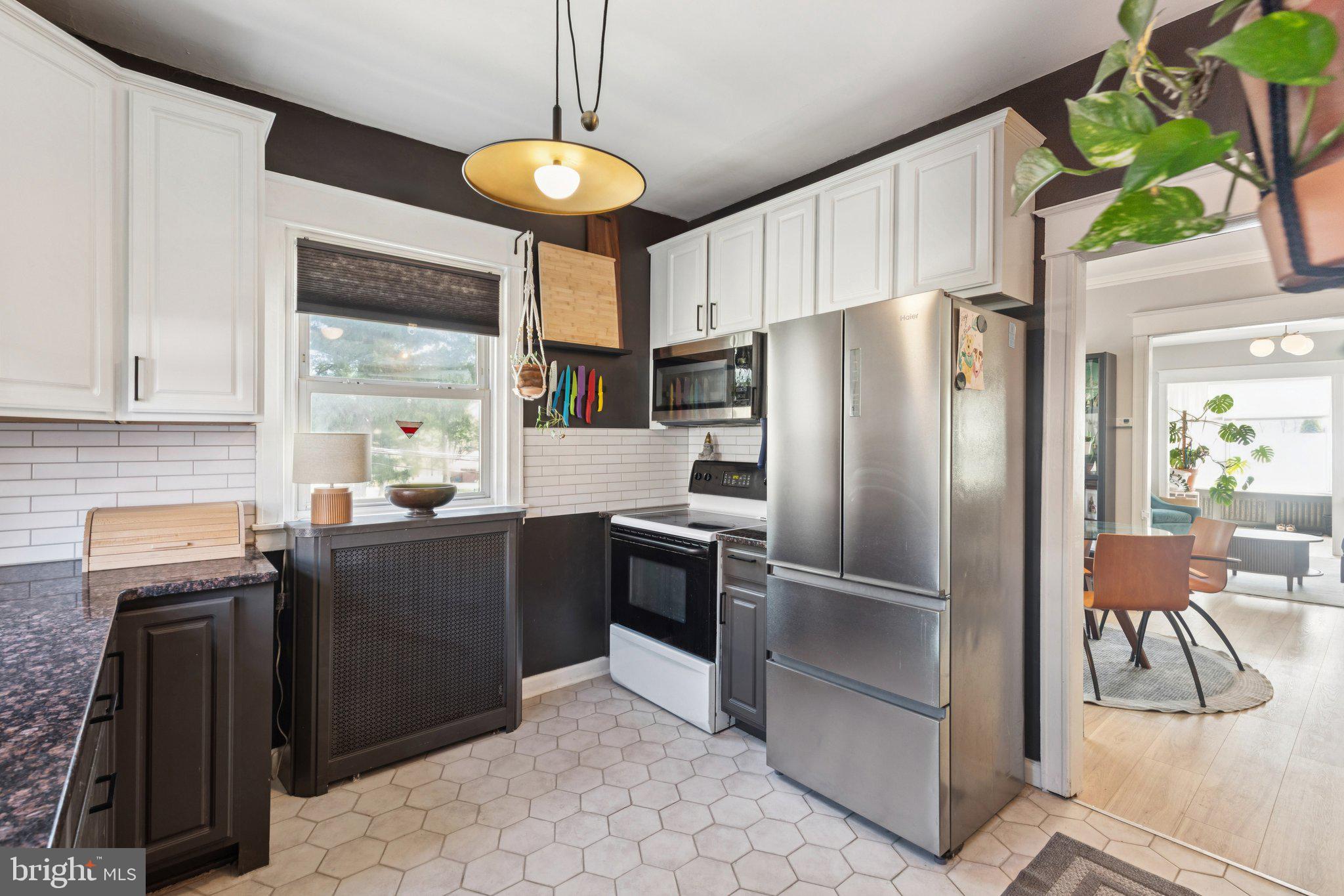 674 Wendover Street Philadelphia, PA 19128 - Photo 22 of 50 Charming kitchen with modern flair.