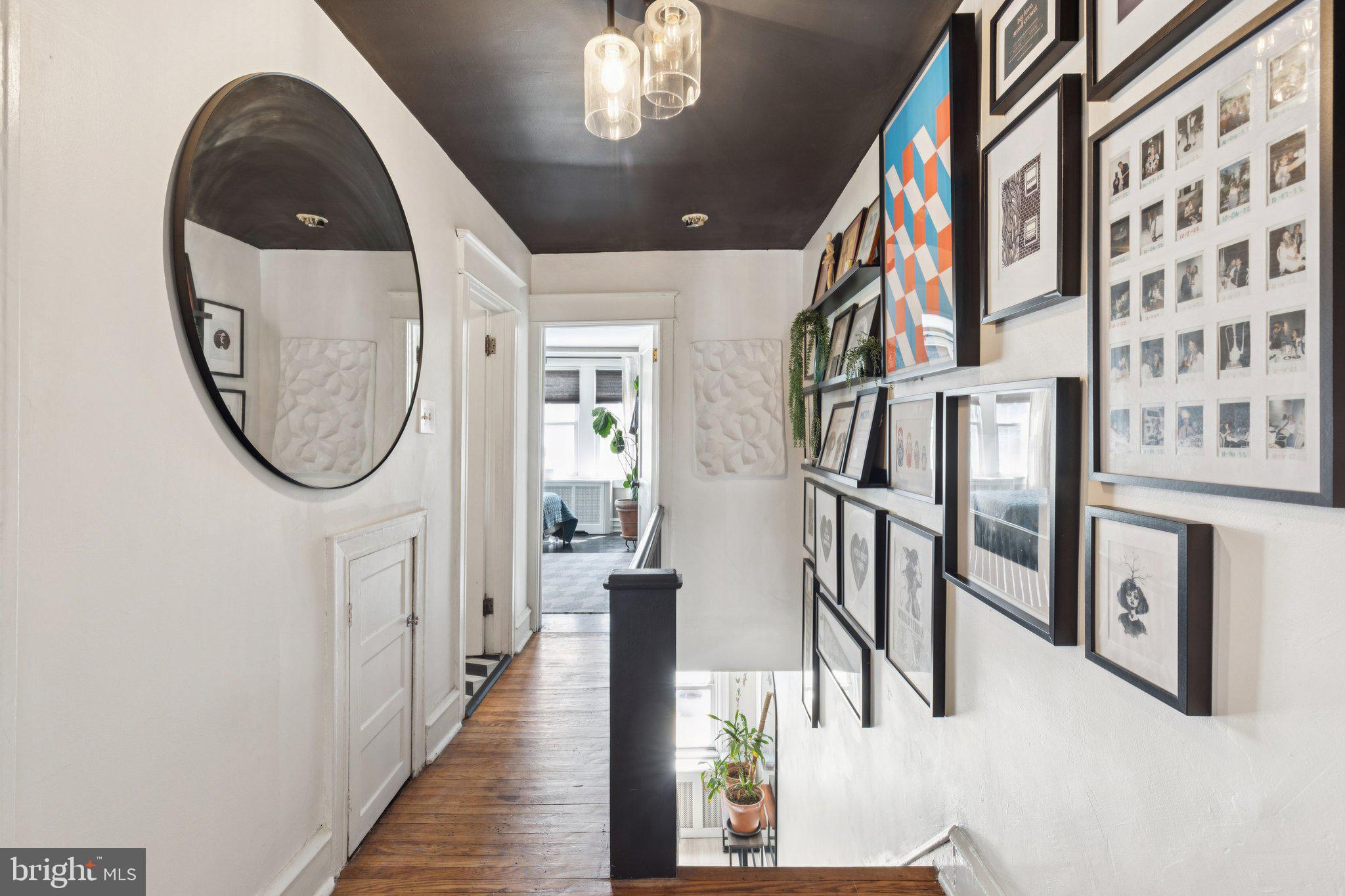 674 Wendover Street Philadelphia, PA 19128 - Photo 24 of 50 Chic hallway with artful flair.