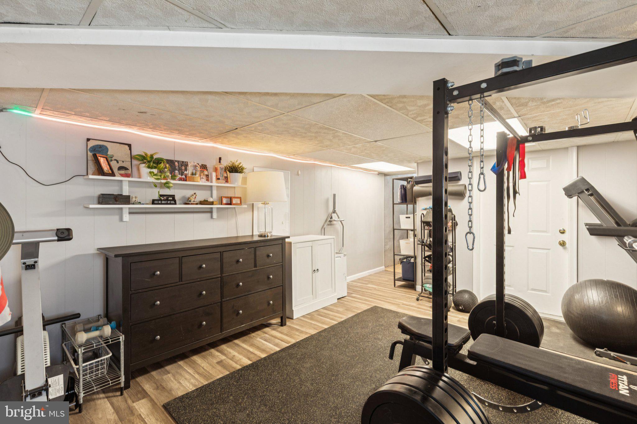 674 Wendover Street Philadelphia, PA 19128 - Photo 41 of 50 Modern basement gym with sleek design.