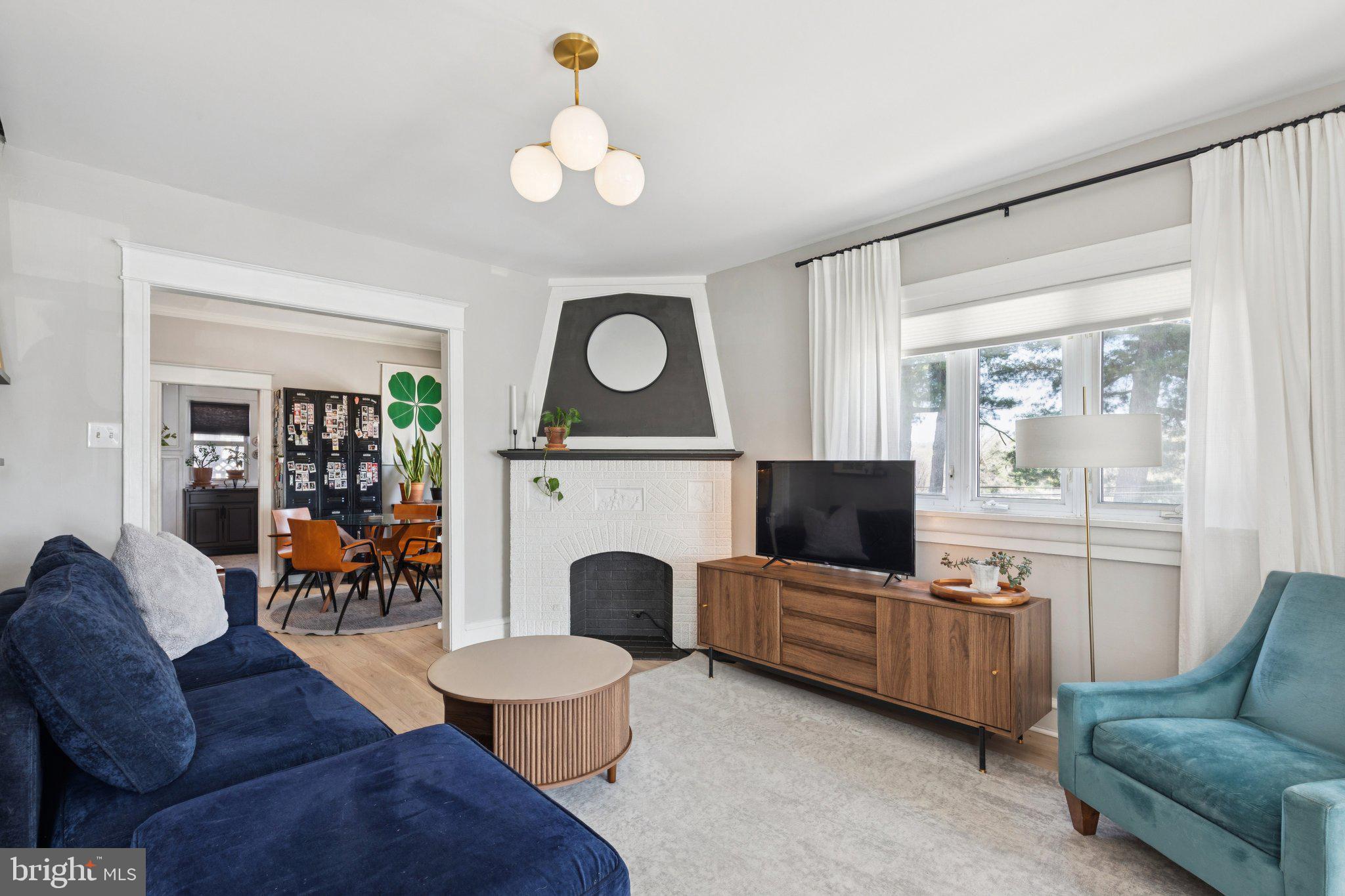 674 Wendover Street Philadelphia, PA 19128 - Photo 6 of 50 Charming living space with modern flair.