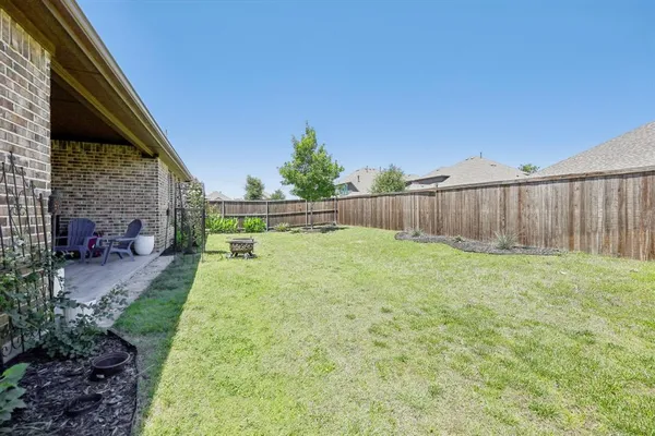 a view of outdoor space and yard