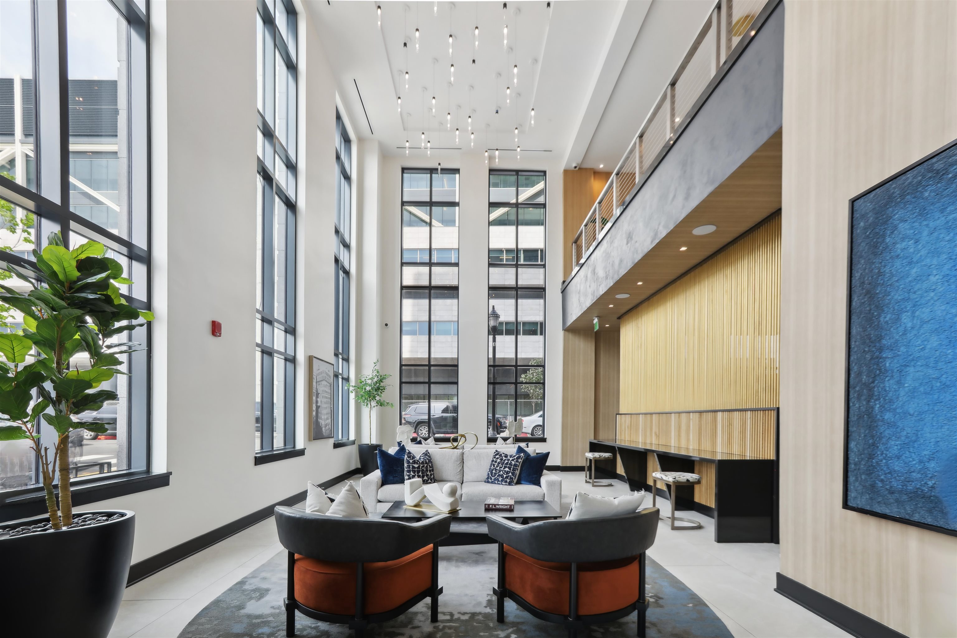 32 Oakland Avenue, Unit 1504 Jersey City, NJ 07306 - Photo 18 of 50 a dining room with furniture and a potted plant