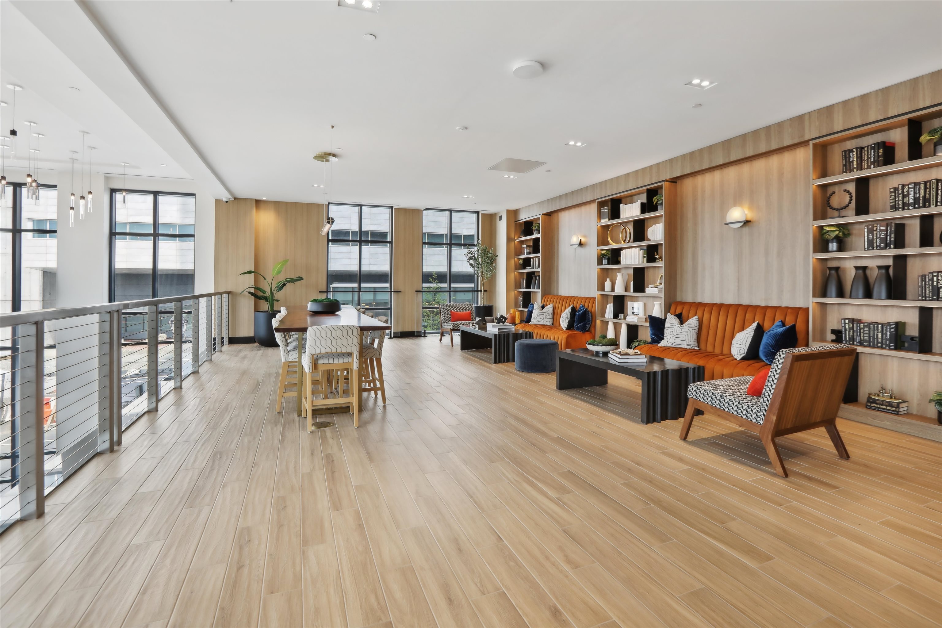 32 Oakland Avenue, Unit 1504 Jersey City, NJ 07306 - Photo 19 of 50 a living room with furniture and a wooden floor
