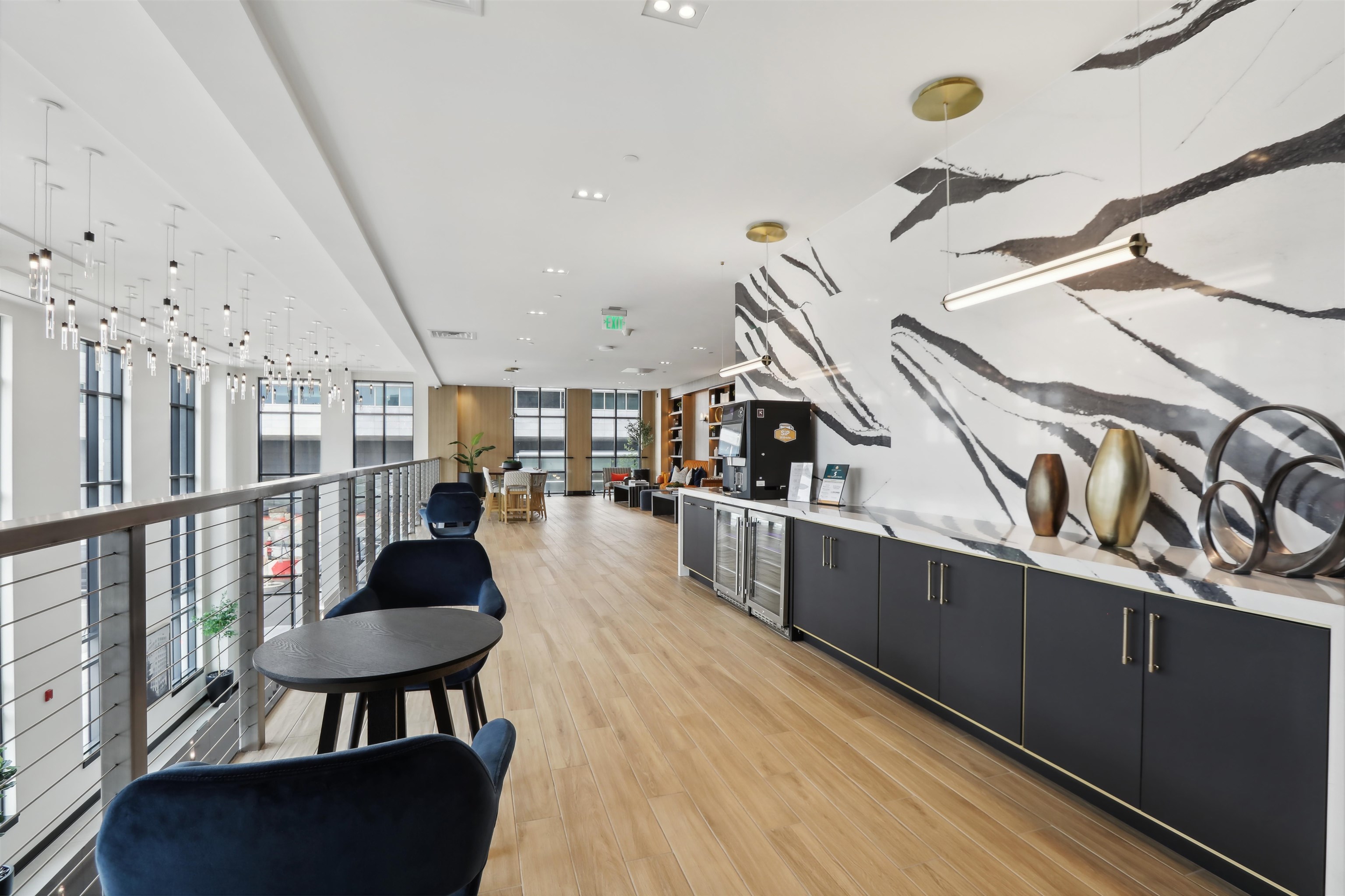32 Oakland Avenue, Unit 1504 Jersey City, NJ 07306 - Photo 20 of 50 a dining room with furniture and a floor to ceiling window
