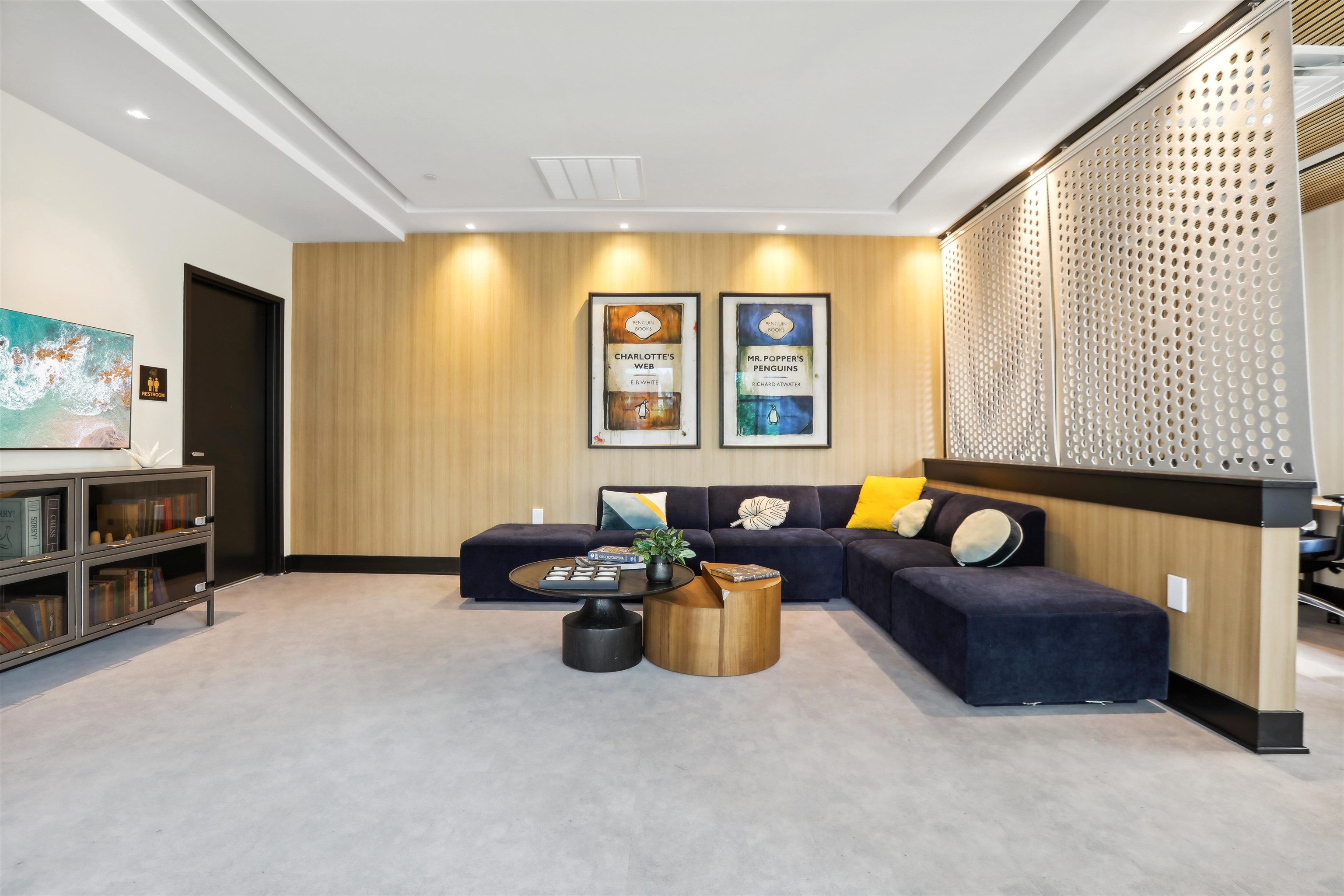 32 Oakland Avenue, Unit 1504 Jersey City, NJ 07306 - Photo 26 of 50 a living room with furniture and a flat screen tv